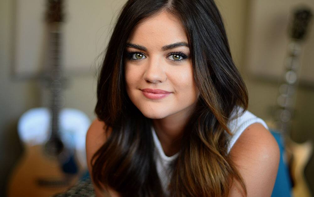 Artist and actress Lucy Hale poses for a portrait in Burbank, Calif. Hale's debut country album “Road Between,” releases June 3, 2014. 