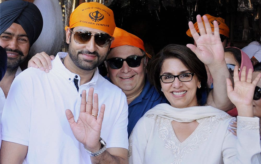 Abhishek Bachchan, Rishi Kapoor and Neetu Singh after paying obeisance at Golden Temple in Amritsar.