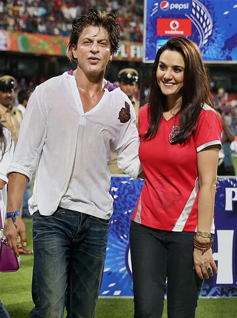 Kolkata Knight Riders' Co-owner Shahrukh Khan with KXIP's Priety Zinta during the IPL 7 final match at M Chinnaswamy stadium, in Bengaluru.