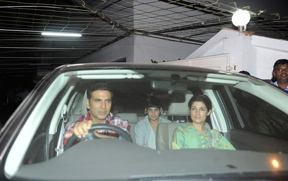 Akshay Kumar with Twinkle and Aarav at the special screening of upcoming film Holiday in Mumbai.