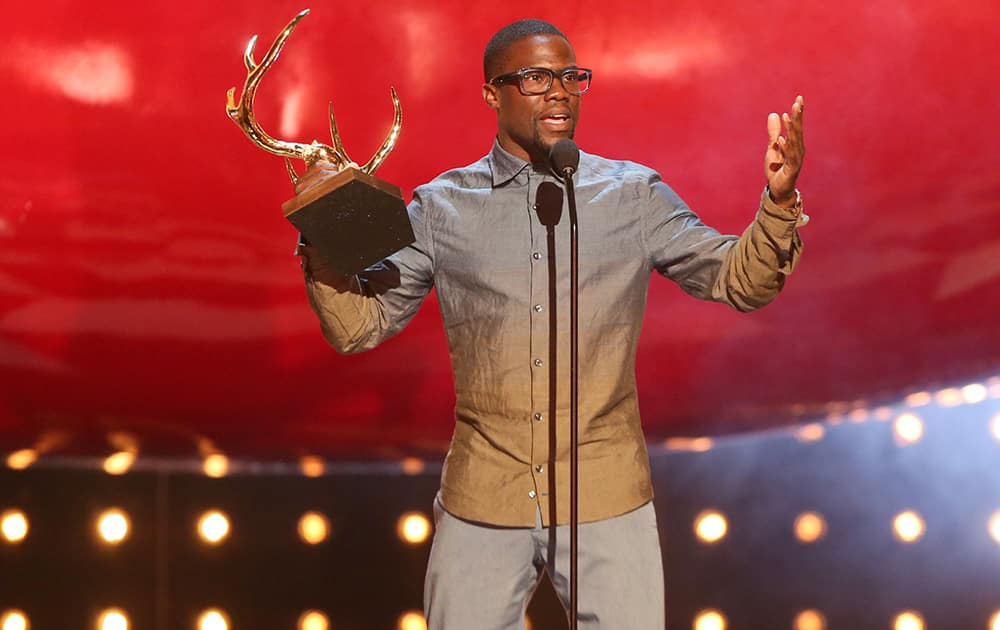 Kevin Hart accepts the king of comedy award on stage at the Guys Choice Awards at Sony Pictures Studios.