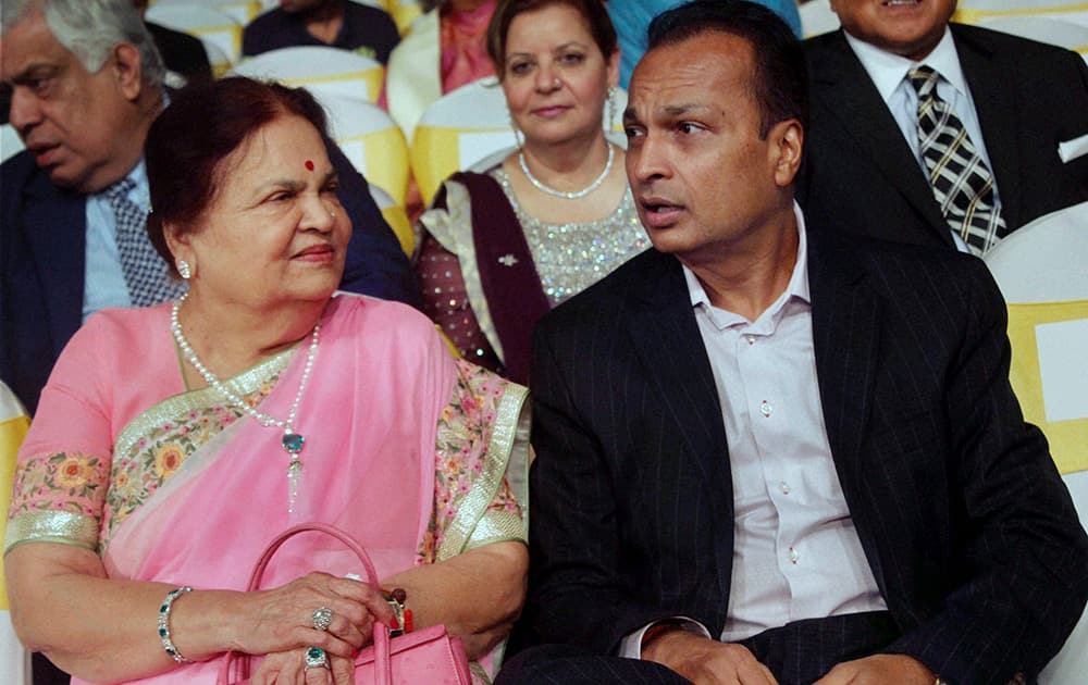 Industrialist Anil Ambani with mother Kokilaben during the launch of veteran actor Dilip Kumar's autobiography in Mumbai.