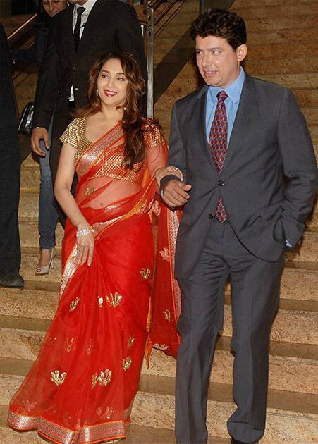 Madhuri Dixit and her husband Sriram Nene attend the launch of veteran actor Dilip Kumar's autobiography 'Substance and the Shadow' on Monday in Mumbai.