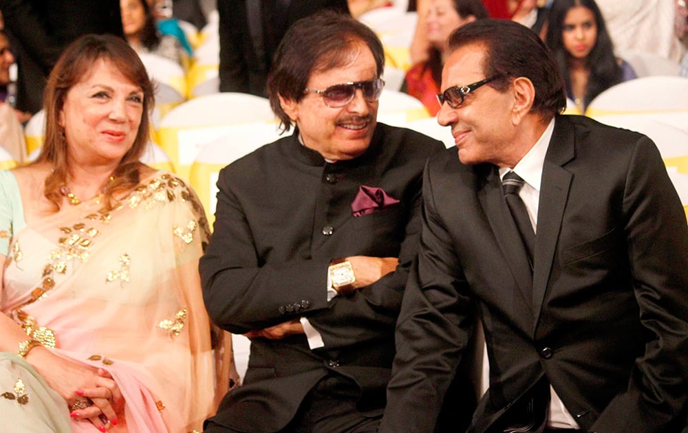 Zarine and Sanjay Khan with Dharmendra during the launch of Dilip Kumar's autobiography 'The Substance and The Shadow' in Mumbai.- Rajneesh Londhe.dna