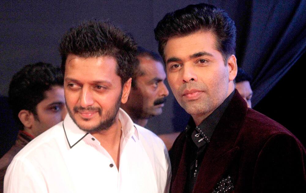 Ritesh Deshmukh (L) and Karan Johar during the launch of Dilip Kumar's autobiography 'The Substance and The Shadow' in Mumbai.- Rajneesh Londhe.dna