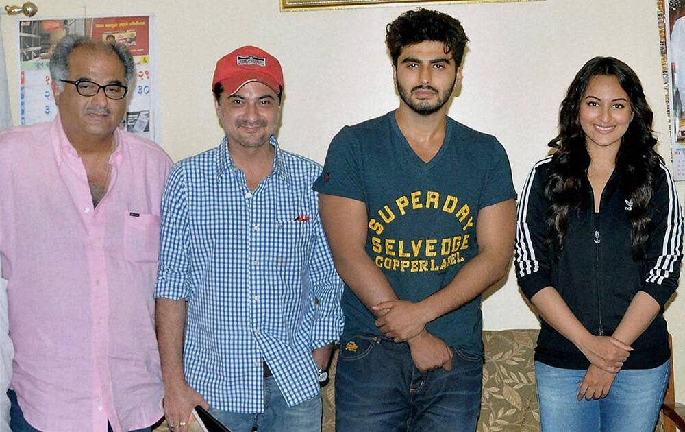 Producer Boney Kapoor (L) with actors Sanjay Kapoor, Arjun Kapoor and actress Sonakshi Sinha in Akluj, Maharastra.