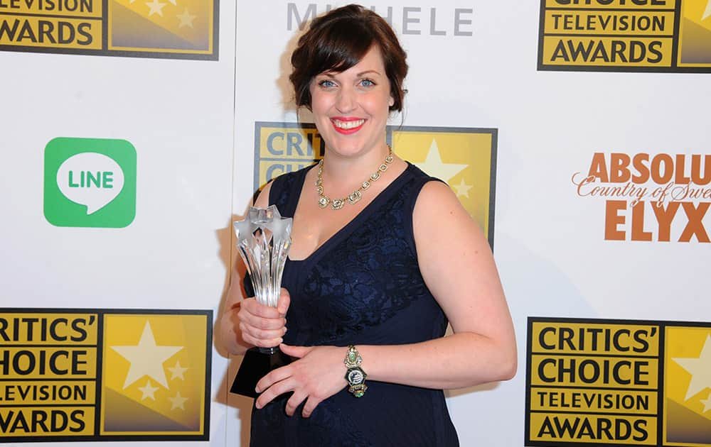 Allison Tolman poses with the award for best supporting actress in a movie or mini-series for 'Fargo' in the press room at the Critics' Choice Television Awards at the Beverly Hilton Hotel.