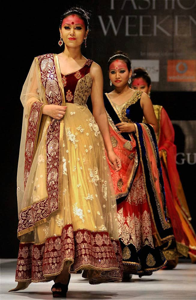 Models walk the ramp during a fashion show at ITA cultural complex in Guwahati.