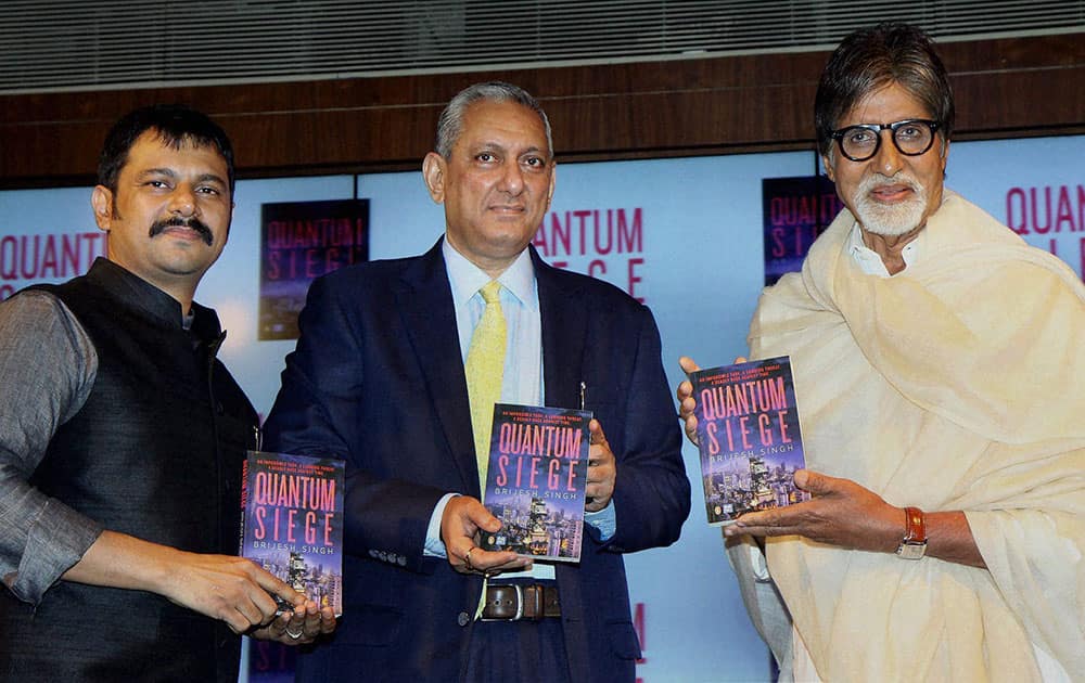 Bollywood Star Amithabh Bachchan with Mumbai Police Commissioner Rakesh Maria (C) and IPS officer, author Brijesh Singh at the launch of Brijesh's new book Quantum Siege in Mumbai.