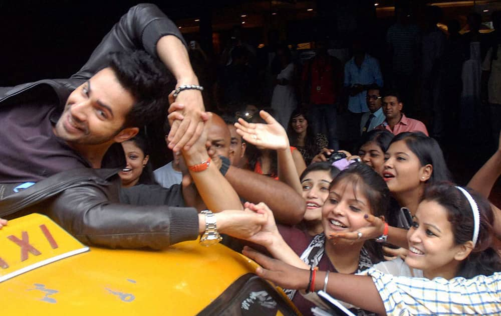 Varun Dhawan with fans during the promotion of his upcoming movie.