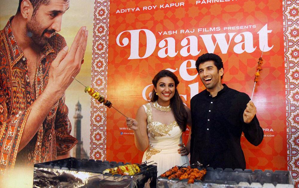 Bollywood actor Aditya Roy Kapur and Parineeti Chopra at a promotional event for their upcoming film 'Daawat-e-Ishq' at YRF Studios in Mumbai.