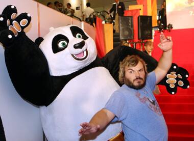 Jack Black poses for photographers with 