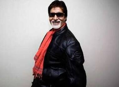 Amitabh Bachchan poses after talking to the media to promote the 