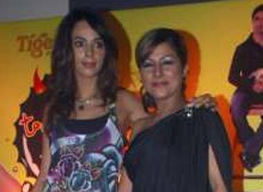 Bollywood actress Mallika Sherawat poses with singer Hard Kaur during a promotional event for her forthcoming movie 