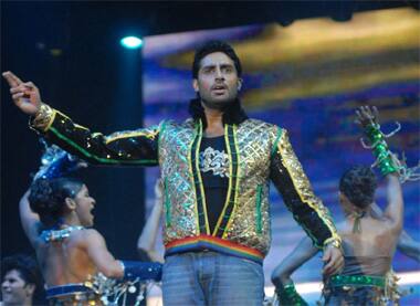 Abhishek Bachchan moves to the beat during a stage performance for 'Unforgettable' show in Canada.