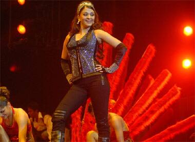 Aishwarya Rai Bachchan swings to 'Dhoom Macha De' during the 'Unforgettable' show in Toronto.