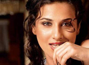 Vidya gives a seductive look for a FHM photoshoot.  