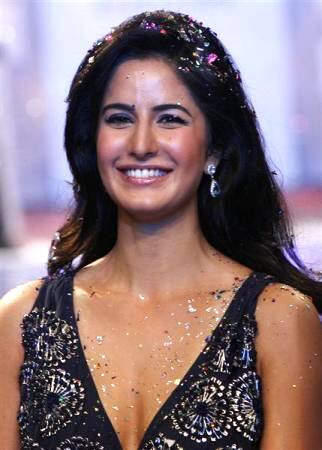 Katrina Kaif presents a creation from designers Anamika Khanna and Ashish Soni at the Wills Lifestyle India Fashion Week in New Delhi.