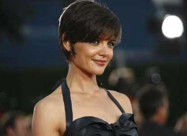 Katie Holmes shows her dimples at the premiere of 