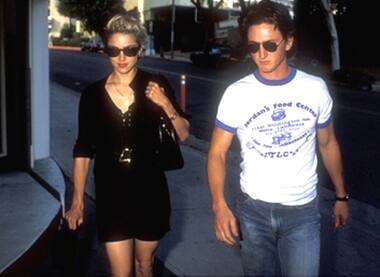 The superstar walks with then-husband Sean Penn. The two were married on her 27th birthday, Aug 16, 1985 and later divorced Jan 10, 1989.