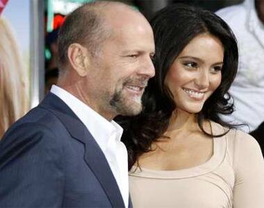 Bruce Willis and his girlfriend Heming at the premiere 