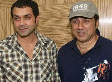 Brothers in arms: Sunny and Bobby Deol pose at a function in New Delhi.