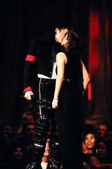 Kiss kiss: Michael Jackson kisses first wife Lisa Marie Presley, daughter of Elvis Presley.