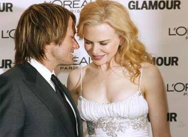 Nicole Kidman with her husband Keith Urban at the Glamour Women of the Year award ceremony.