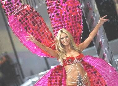 Beauty takes wings: Supermodel Heidi Klum in a pink ensemble.