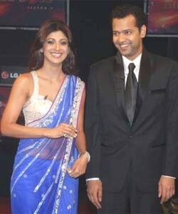 Shilpa Shety and evicted 'Bigg Boss' contestant Rahul Mahajan sgare a light moment.