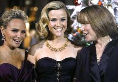 Reese Witherspoon with Kristin Chenoweth and Sissy Spacek at a movie premiere.