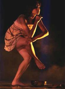 Animal pose: Actress Laura Lucena performs during the Second International Harp Festival in Asuncion.