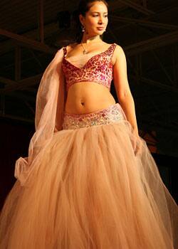 Bollywood hottie Kim Sharma showcases a wedding collection at a fashion event held in Toronto.