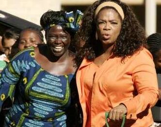 Oprah Winfrey and Environmentalist Wangari Maathai at a tree during a Tree Planting & Dedication ceremony.