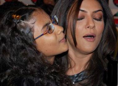 A sweet gesture: Sushmita Sen gets a cosy hug from her daughter Renee Sen.