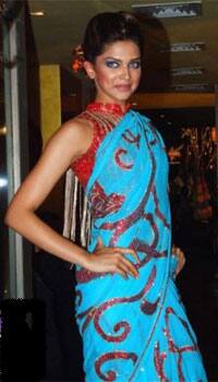 Supermodel- Actor Deepika Padukone drapes a traditional look as she walks the ramp for designer Azeem Khan.