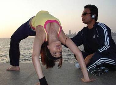 Irrfan Khan ogles Payal Rohatagi as she tries a 'sexy' yoga posture.