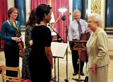 Queenly symphony: Queen Elizabeth speaks with US Secretary of State Condoleezza Rice after a private musical concert with members of the London Symphony Orchestra at Buckingham Palace in London.