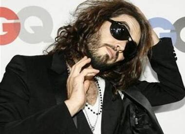 Russell Brand poses at the 13th annual GQ magazine 'Men of the Year' party in LA.