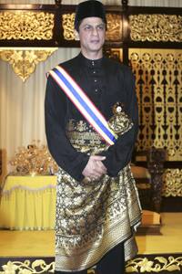 Datuk Shah Rukh: King Khan in traditional official Malay costume and songkok cap after receiving Datukship from Malacca state Governor Mohammad Khalil Yaakob in Malacca.