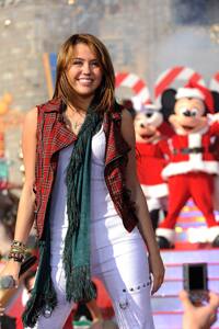 Merry Miley: Singer Miley Cyrus tapes a segment of the ‘Walt Disney World Christmas Day Parade’.