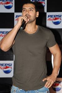 Hot-bod John Abraham speaks at a promotional event in Delhi.