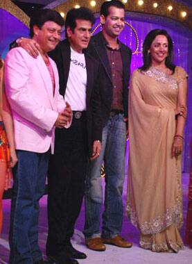 Hema Malini, Rahul Mahajan, Jeetendra and Sachin pose for shutterbugs at a media event.