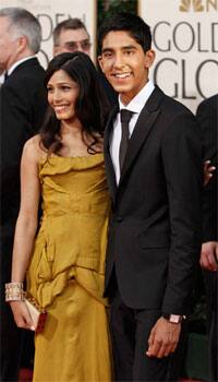 The 'Slumdog' starlets Freida Pinto and Dev Patel pose for shutterbugs.