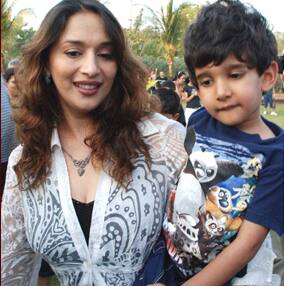 Yummy-mummy Madhuri spotted with her son at an event in Mumbai