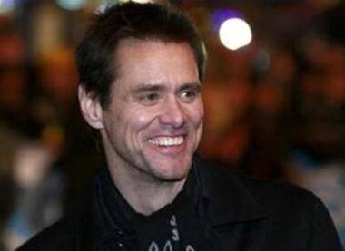 Jim Carrey smiles as he arrives for the UK premiere of 'Yes Man' in Leicester Square