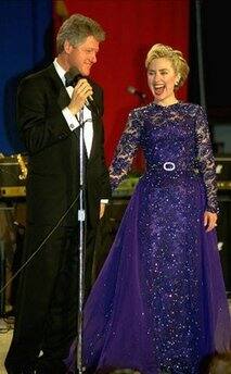 President Clinton and his wife Hillary Rodham Clinton share a laugh at the Youth Ball at the Post Office Pavilion on January 20, 1993.