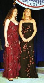 US President George W. Bush's twin daughters Barbara (L) and Jenna attend the Florida Presidential Inaugural Ball at the National Building Museum.