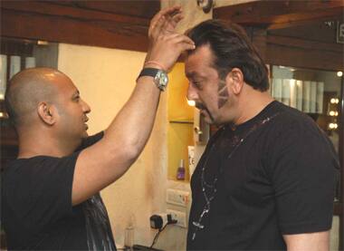 Sanjay Dutt with hair dresser Aryan Khan. 