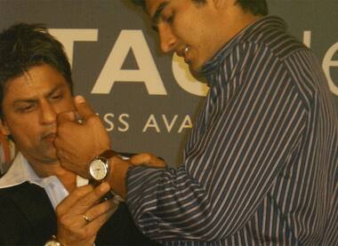 Shah Rukh and Vijender Singh pose with their classy TAG Heuer watches at a media event in New Delhi.